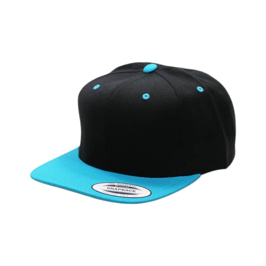 Black and blue snapback cap on a white background
