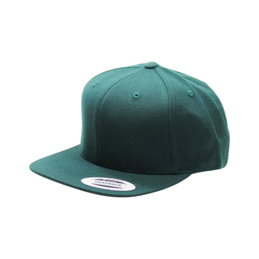 Green cap with a white label on a white background