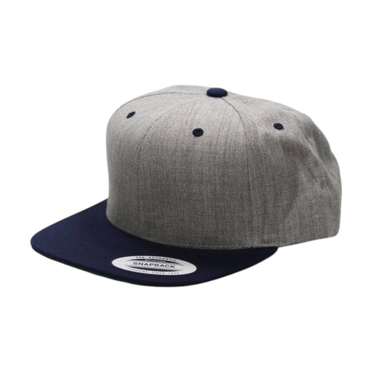 Gray and navy snapback cap on a white background