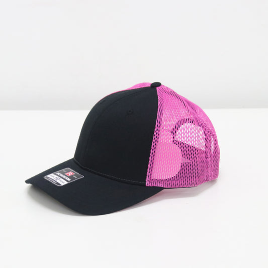 Black and pink cap with mesh back on a white background