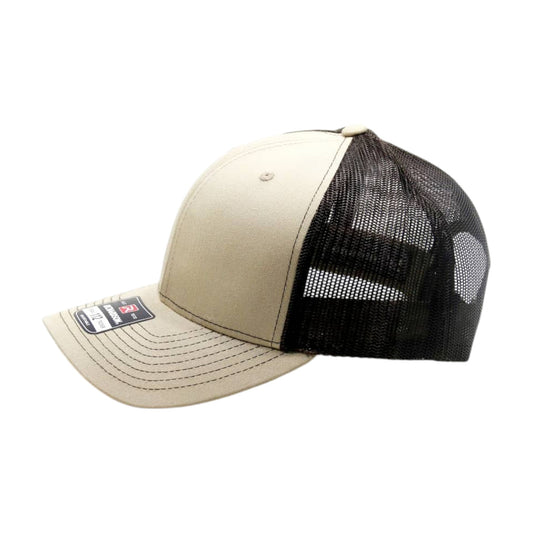 Beige and black trucker cap on a white background