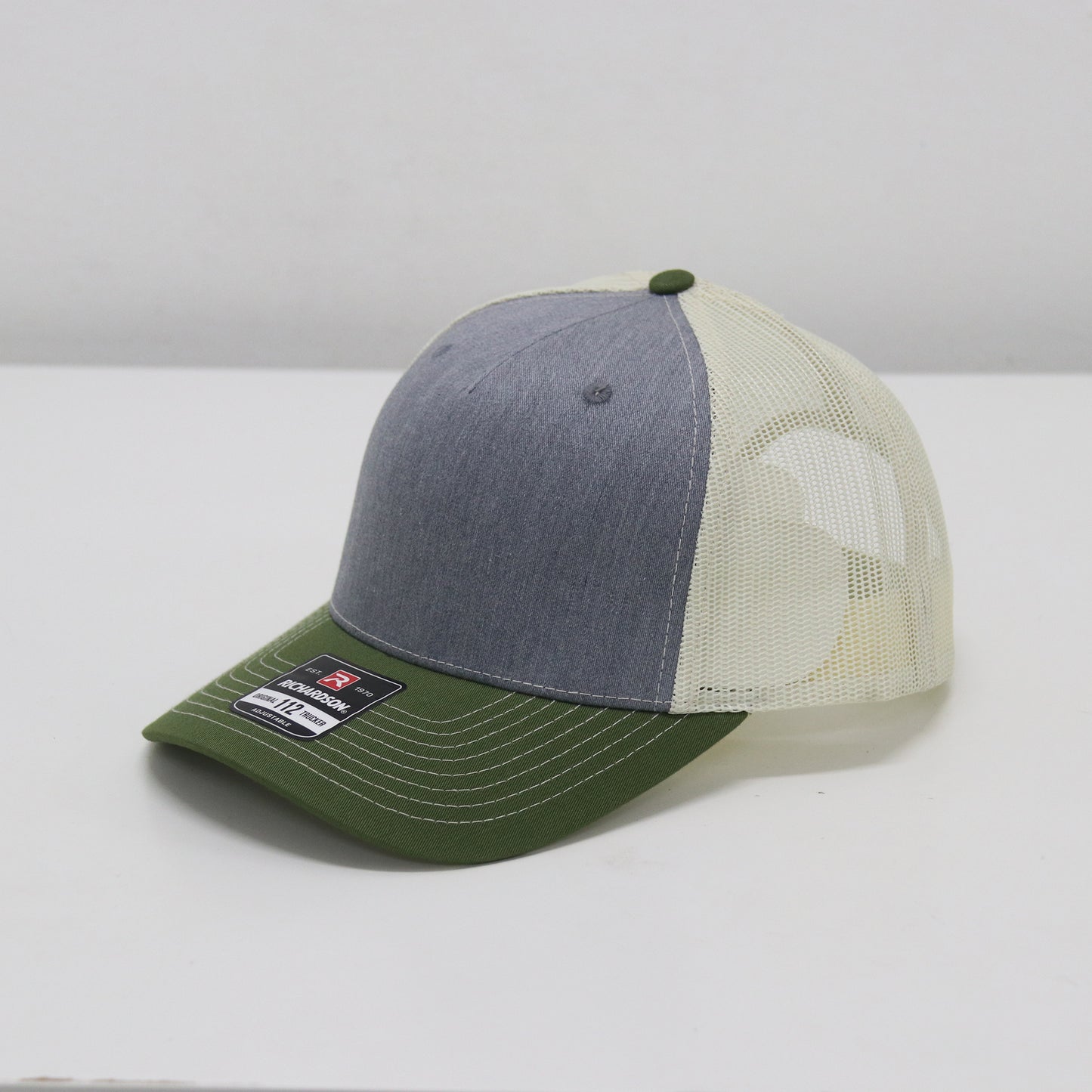 Multicolored cap with mesh back on a white background