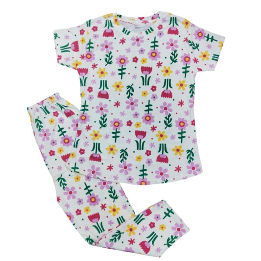 Children's pajama set with floral pattern on a white background
