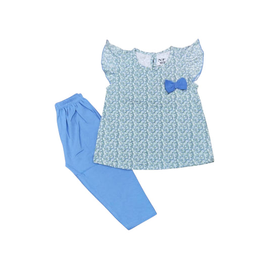 Children's outfit with a floral top and blue pants on a white background