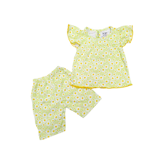 Children's outfit with floral dress and pants on a white background