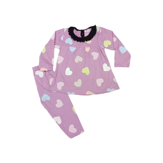 Children's pajama set with heart pattern on a white background