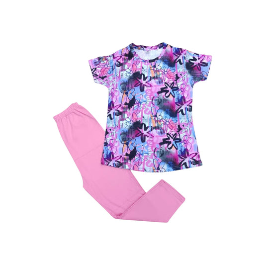 Colorful floral t-shirt and pink pants on a white background