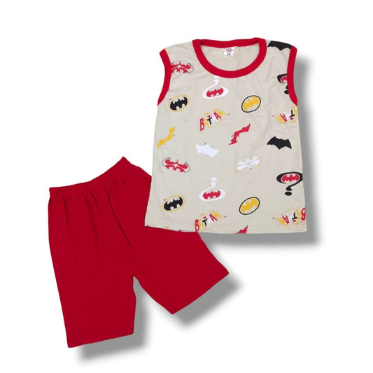 Children's sleeveless top and red shorts set with cartoon designs on a white background