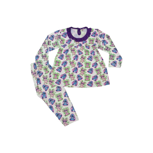 Children's pajama set with colorful frog pattern on a white background