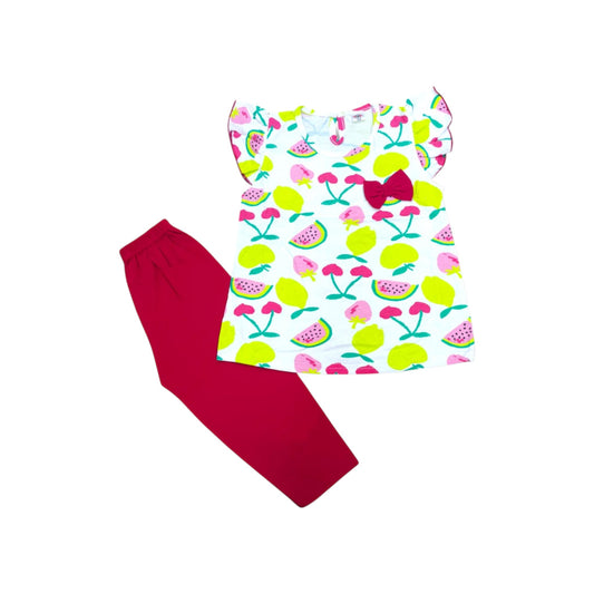 Children's outfit with a colorful patterned top and red pants on a white background