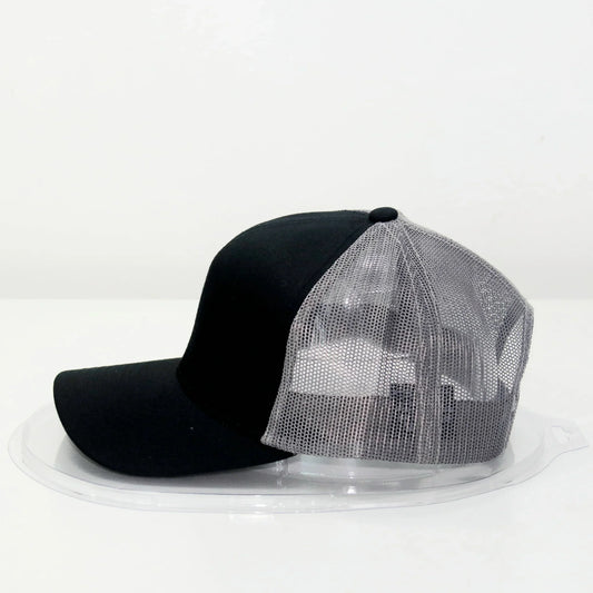 A black trucker cap with a curved brim, displayed on a white background.