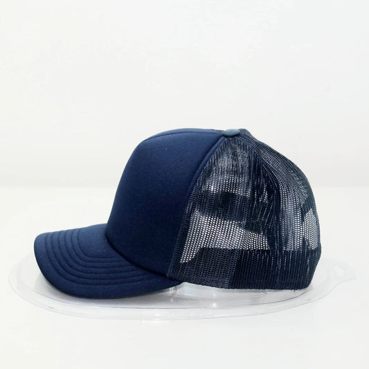 A navy blue trucker cap with a curved brim and a mesh back.
