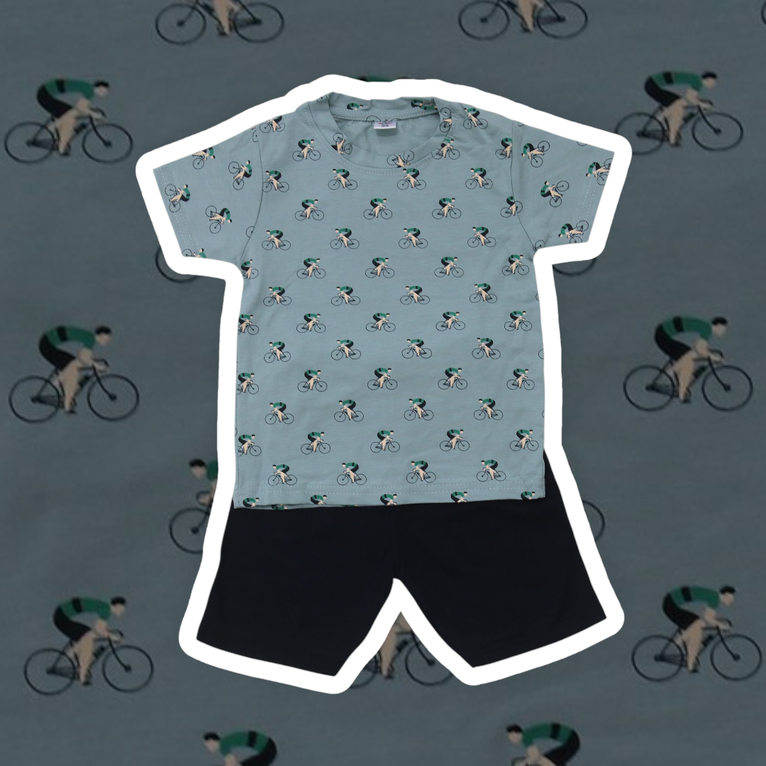 Light blue cycling jersey with black shorts on a background of cyclists.