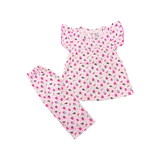 Floral dress and leggings set on a white background