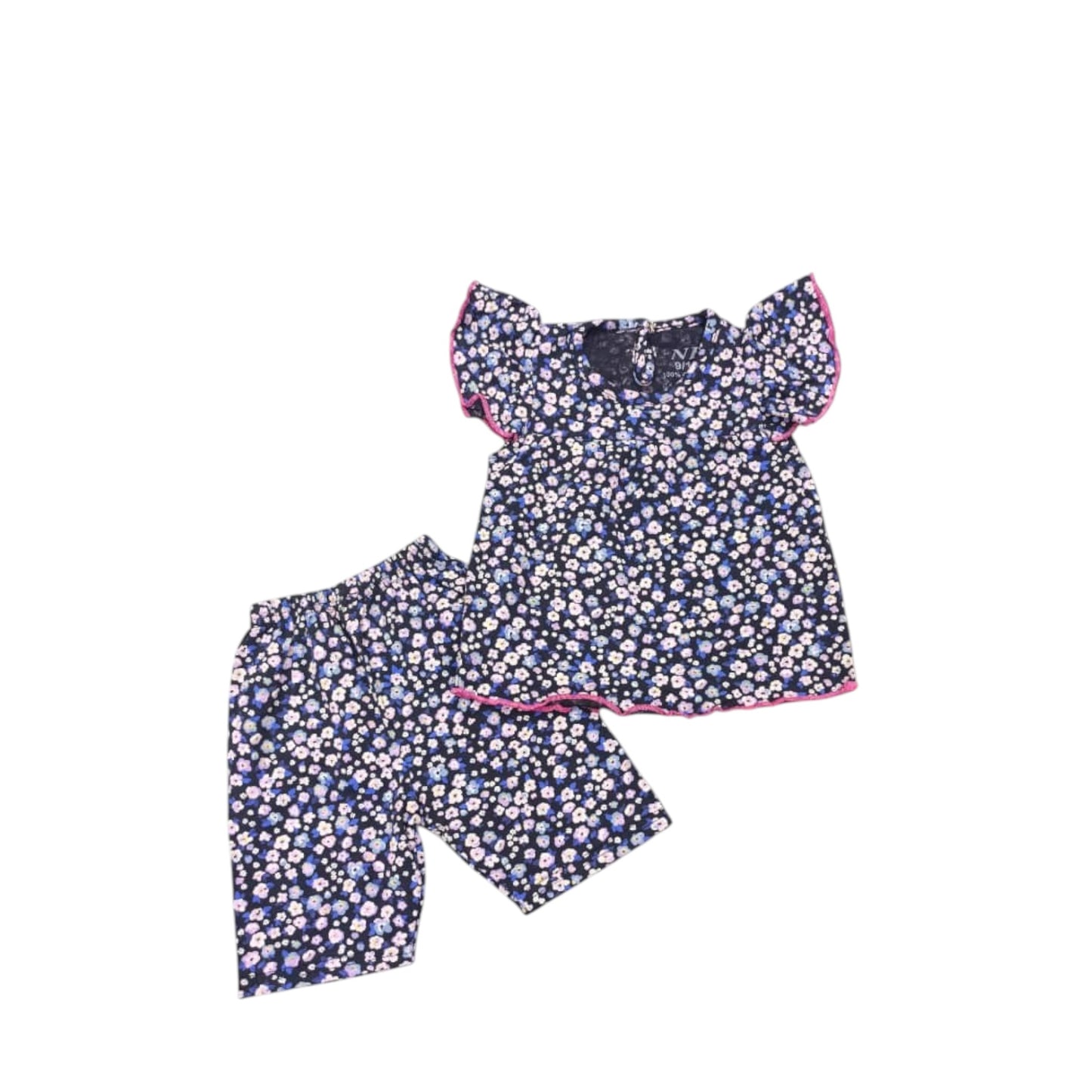 Navy floral top and shorts set on a white background