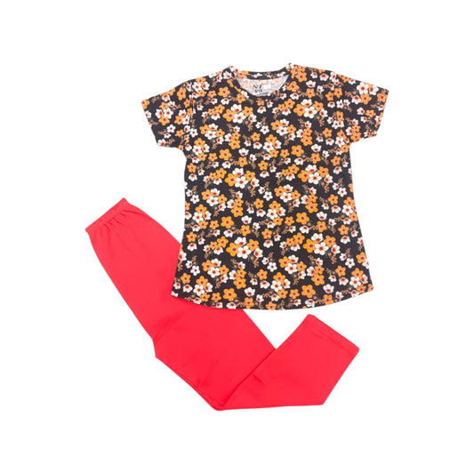 Floral top and red pants on a white background