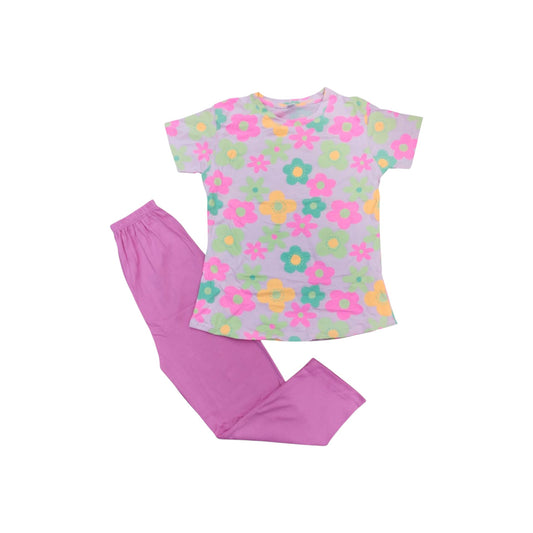 Children's pajama set with floral top and pink pants on a white background