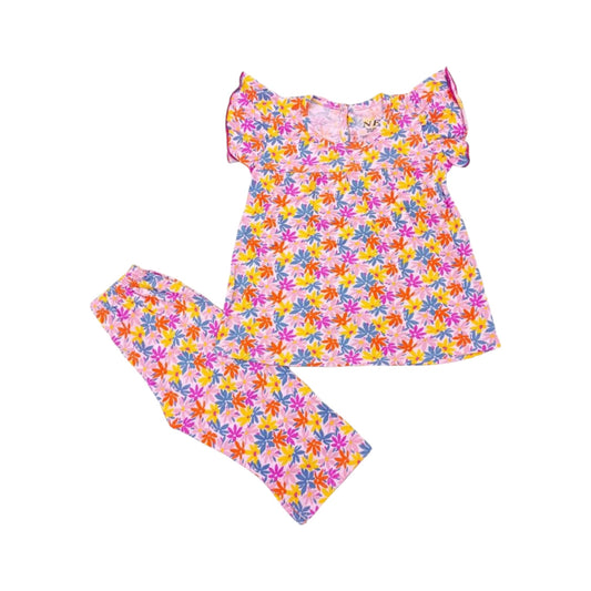 Floral dress and leggings set on a white background