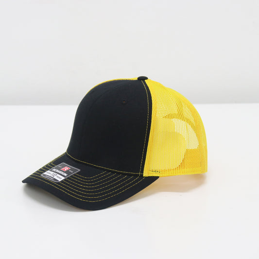 Black and yellow cap with mesh back on a white background