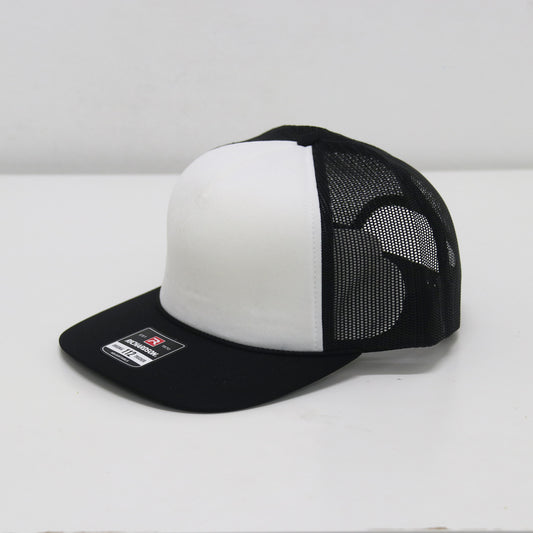 Black and white cap with mesh back on a white background