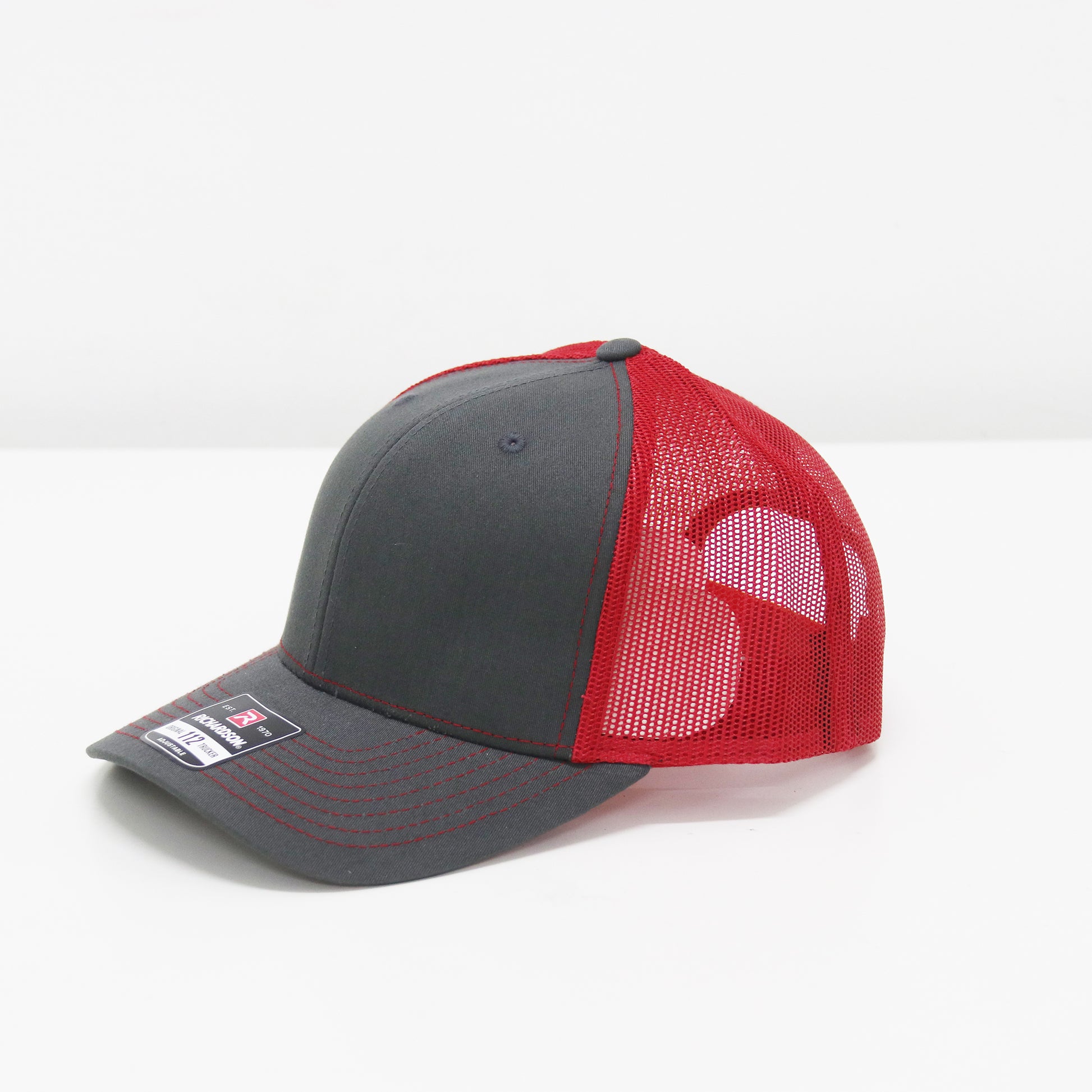 Gray and red baseball cap on a white background