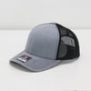 Gray and black baseball cap on a white background