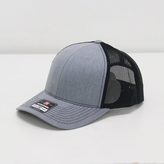 Gray and black baseball cap on a white background