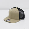 Beige and black cap with mesh back on a white background
