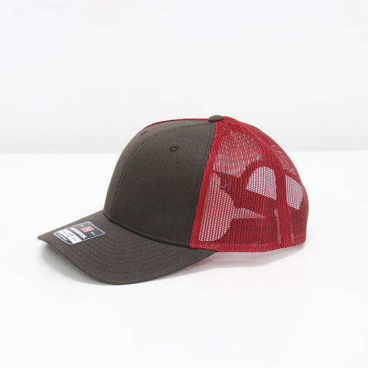 Gray and red mesh cap on a white background