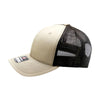 Beige and black trucker cap on a white background