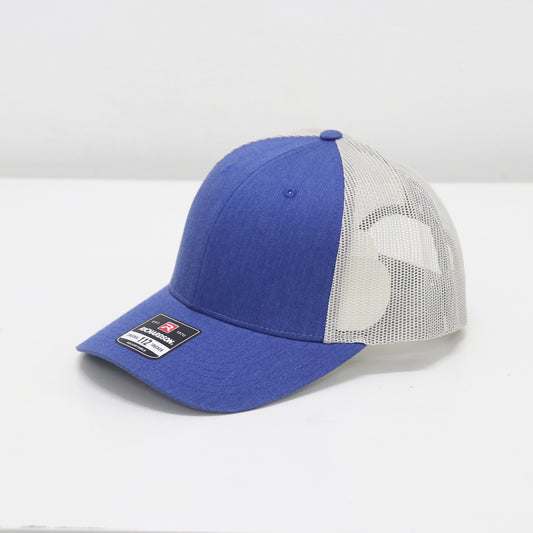 Blue and white cap with a brand label on a white background