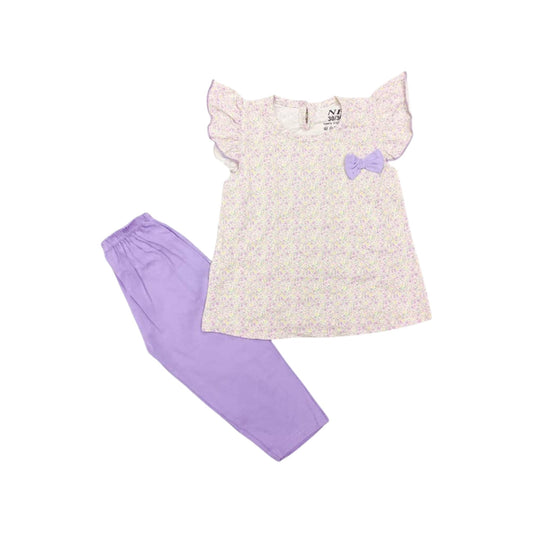 Children's outfit with a floral dress and purple pants on a white background