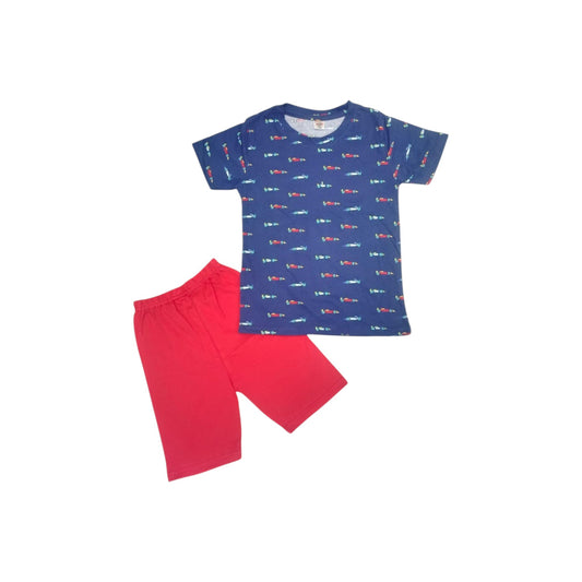 Children's pajama set with blue shirt and red shorts on a white background