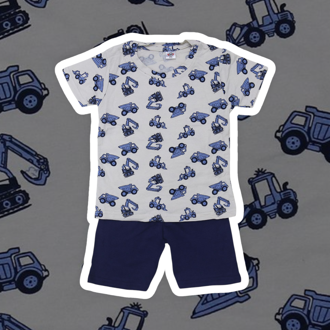 Children's t-shirt and shorts set with blue truck pattern on a gray background with construction vehicle prints.