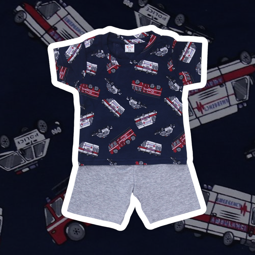 Children's t-shirt with fire truck pattern and gray shorts on a dark background with toy ambulances.