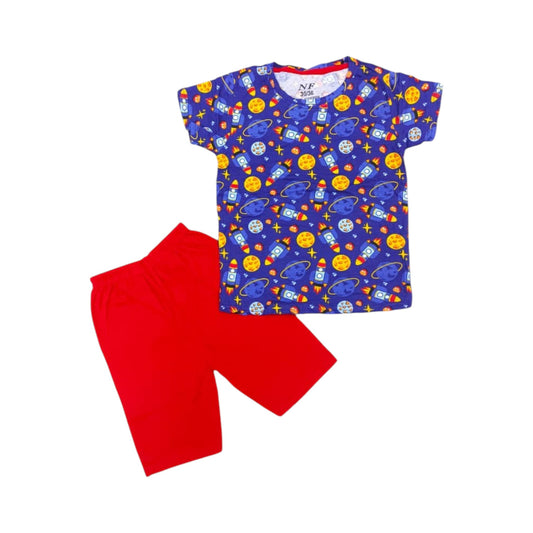 Children's outfit with a blue shirt featuring space-themed design and red shorts on a white background