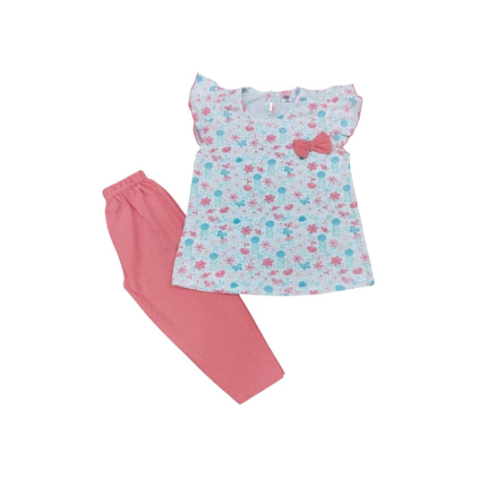 Children's outfit with floral top and pink pants on a white background
