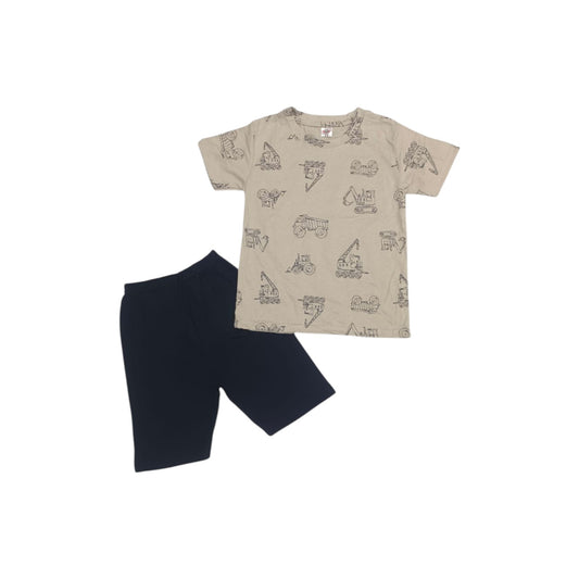 Children's outfit with beige patterned shirt and navy shorts on a white background