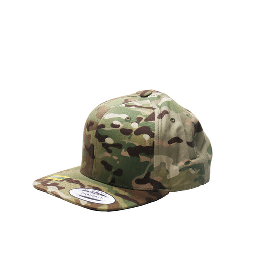 Camouflage cap on a white background