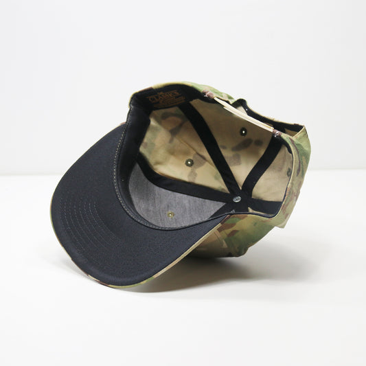 Two baseball caps, one black and one camouflage, on a white background