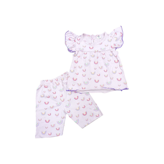 Children's outfit with top and shorts featuring a pattern on a white background