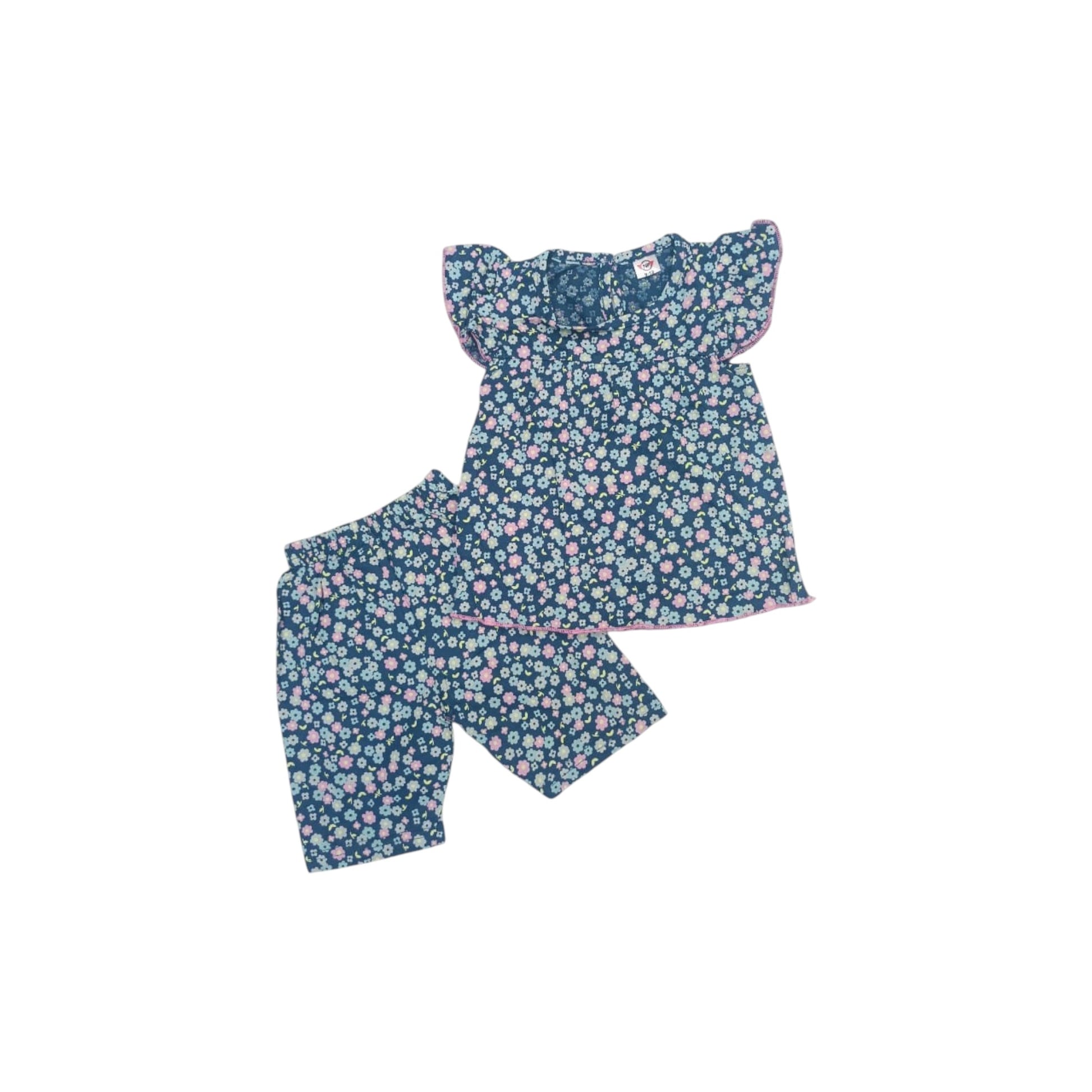 Floral pajama set with top and shorts on a white background