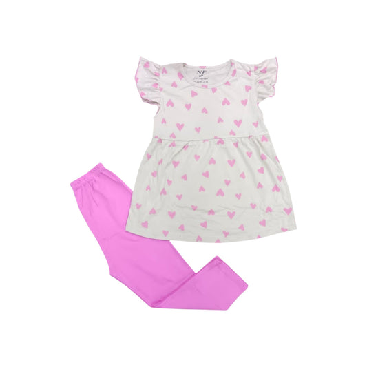 Children's dress with pink heart pattern and pink pants on a white background