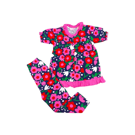 Floral pajama set with pink trim on a white background
