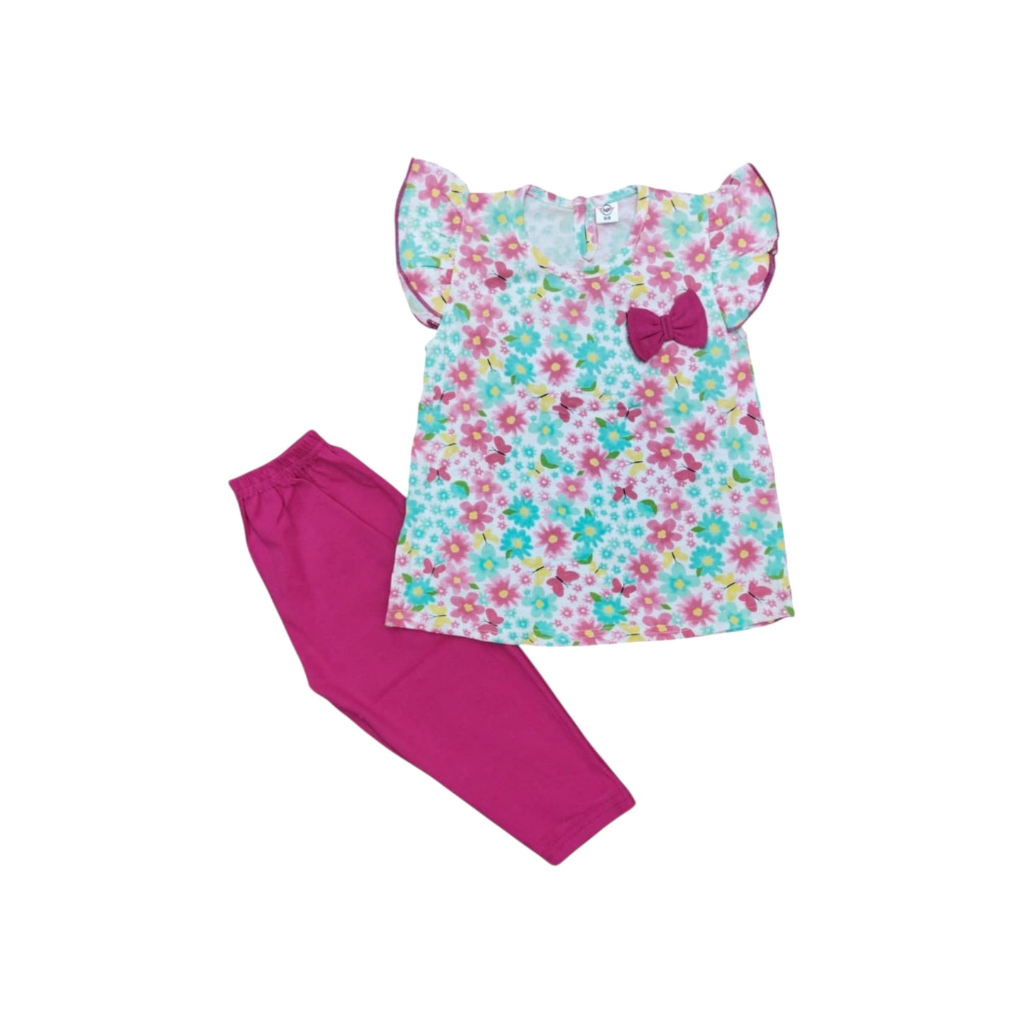 Floral top and pink pants set on a white background
