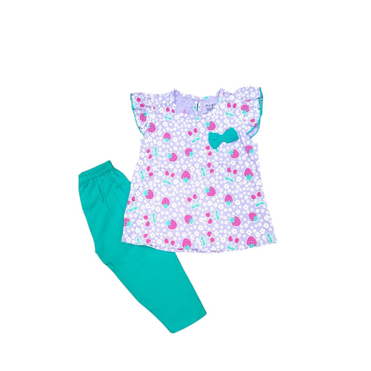Children's outfit with a patterned top and teal pants on a white background