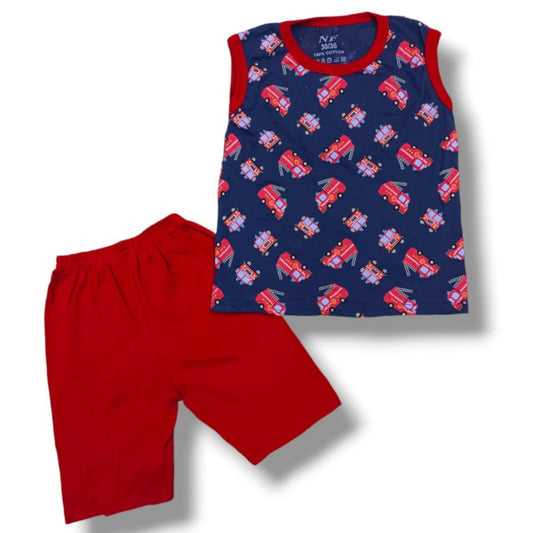 Children's sleeveless top with fire truck pattern and red shorts on a white background