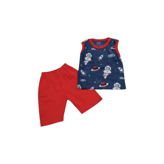 Children's outfit with navy sleeveless top and red shorts on a white background
