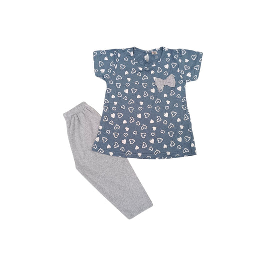Children's outfit with blue top and gray pants on a white background