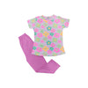 Children's pajama set with floral top and pink pants on a white background
